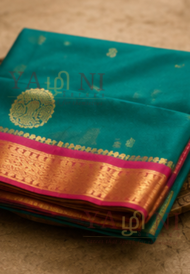 Peacock Green Soft Silk Saree with Pink Border & Traditional Gold Zari Weaving - Image 1